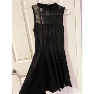 black mockneck sleeveless mini dress